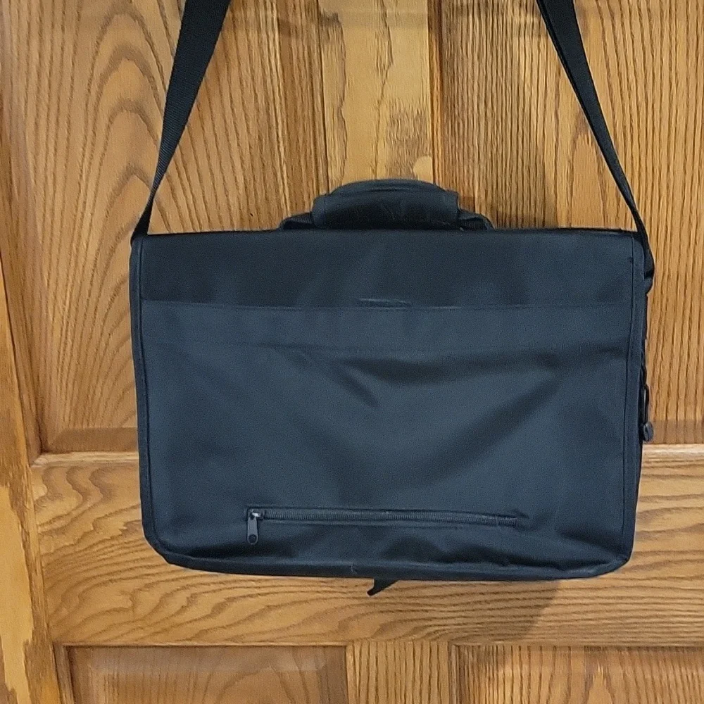 Solo black briefcase with a pullout sleeve for your laptop in black.